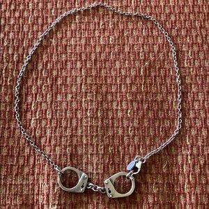 Jessica Elliot sterling silver handcuff necklace.